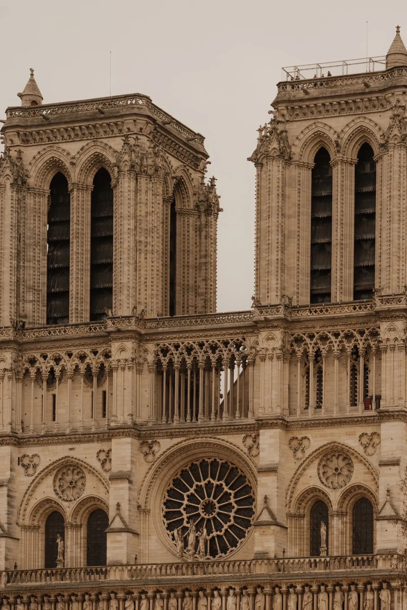 The façade of Notre-Dame today, with the rose window and the gallery of kings in golden light