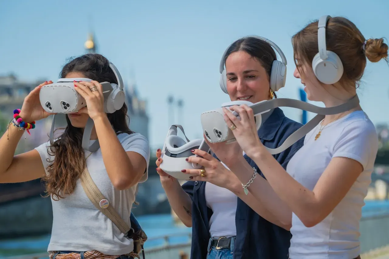 Visitors travel back in time through Timescope virtual-reality binoculars, on the banks of the Seine in Paris